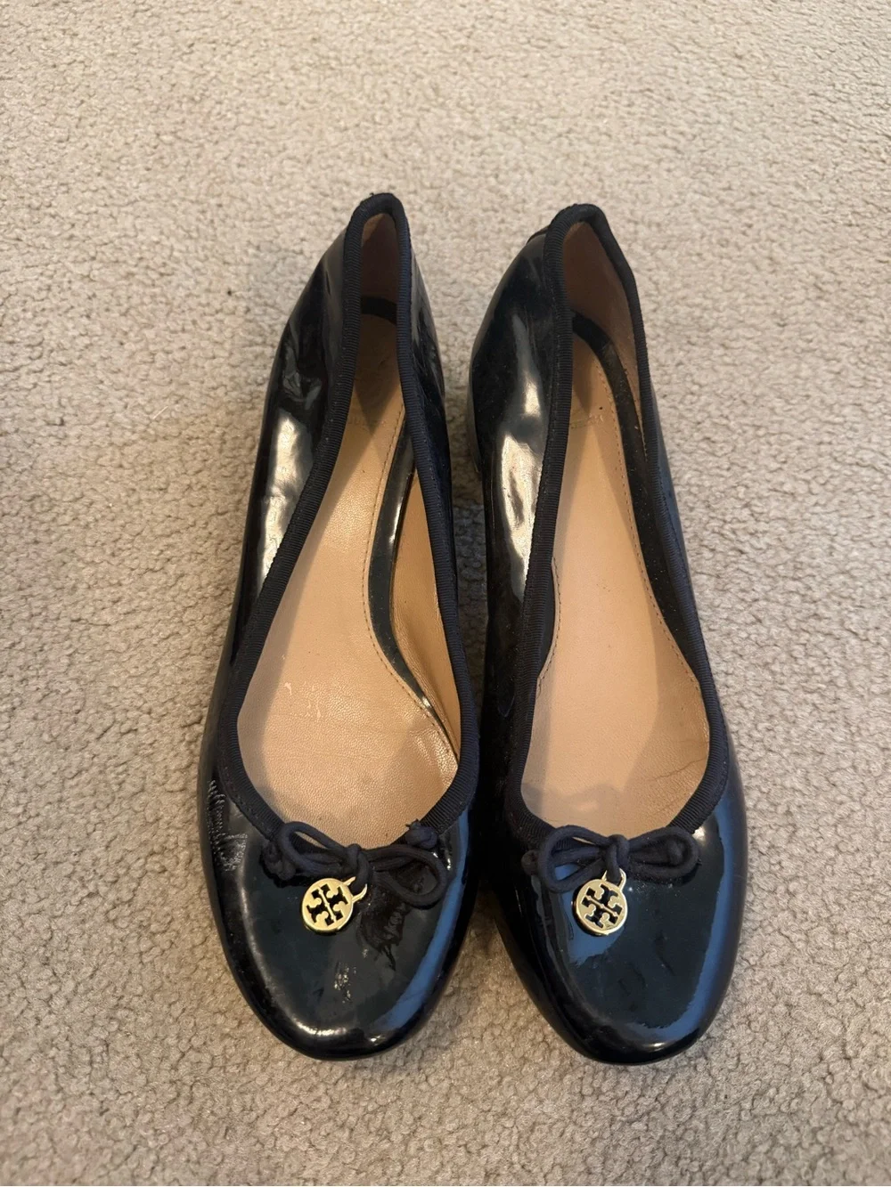 Tory Burch Black Patent Leather Round-Toe heels with bow and Gold Logo